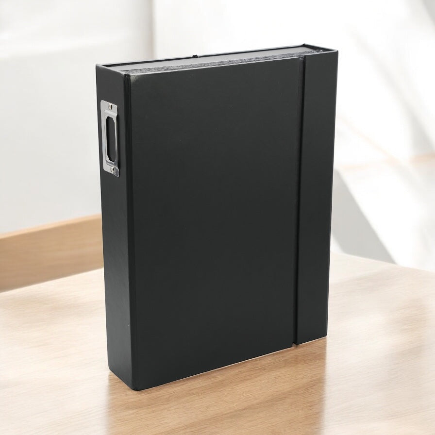Black document storage box. Opens and expands