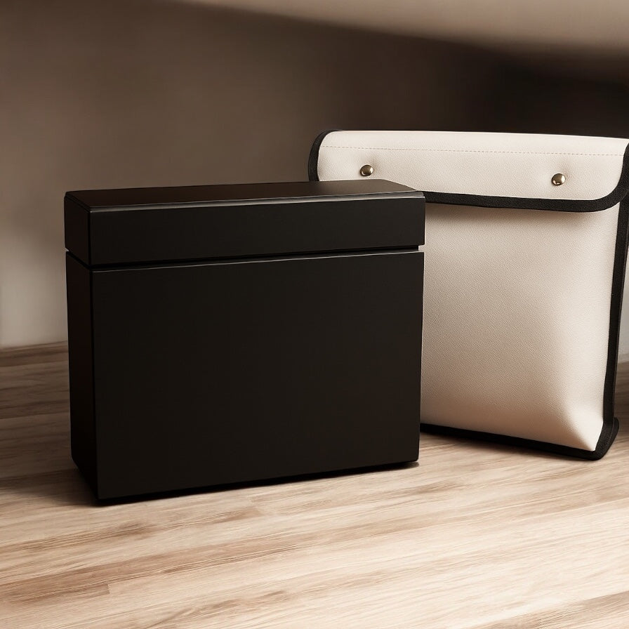 Black storage box and cream color fireproof waterproof storage bag.