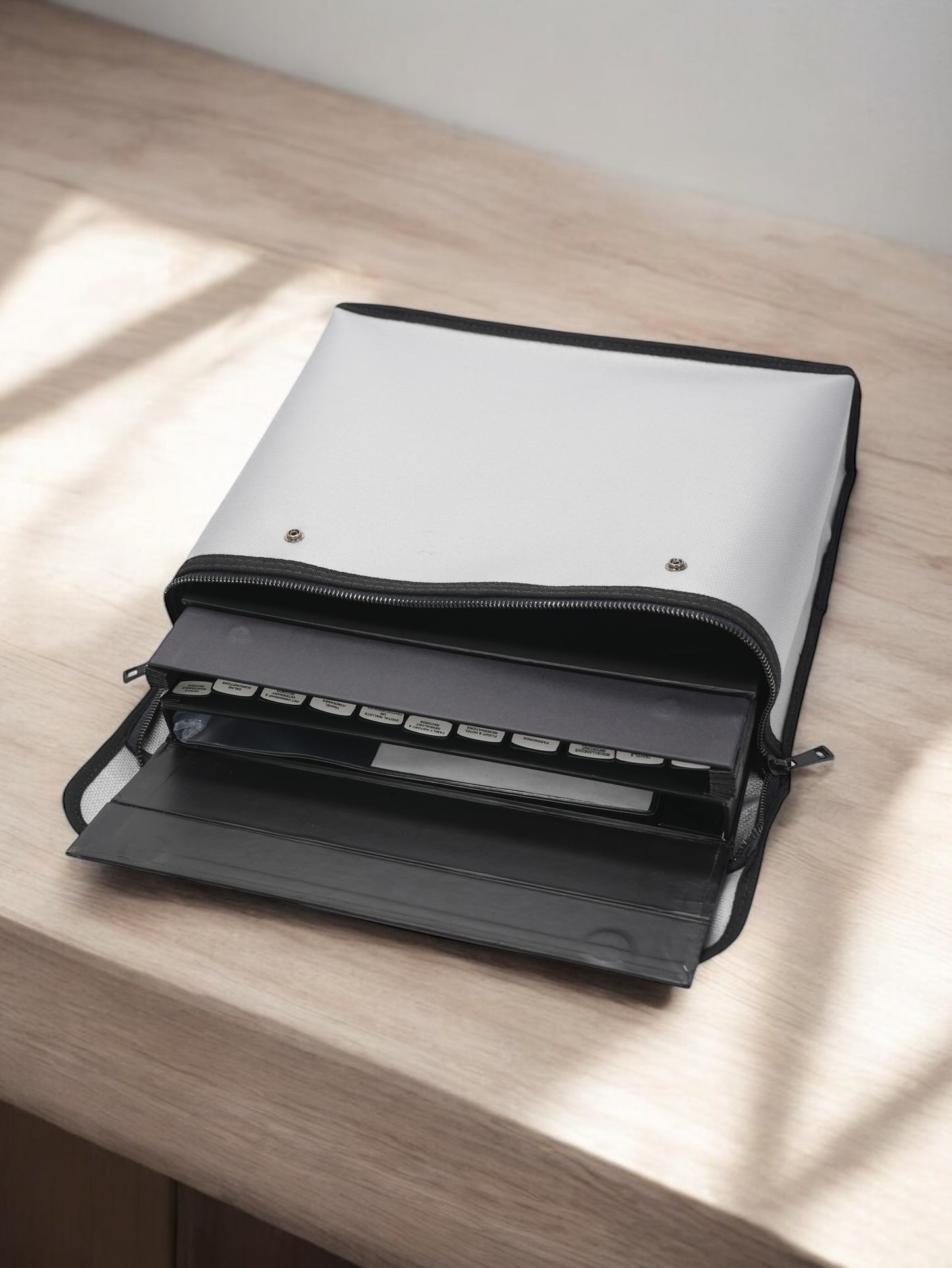 Gray document storage bag with top zipper and pouch to store your most important documents.