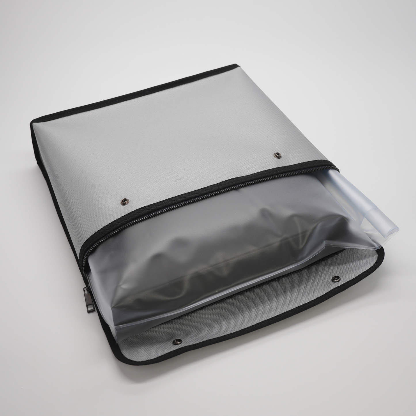 Top zipper opening creating a secure pouch to store document storage box inside a water proof bag.